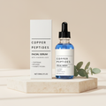 GlowPrep Copper Peptide Serum bottle and box on a stone pedestal
